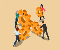 Varias personas portando ruedas dentadas.